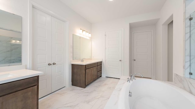 bathroom featuring a bath, walk in shower, two vanities, a sink, and marble finish floor