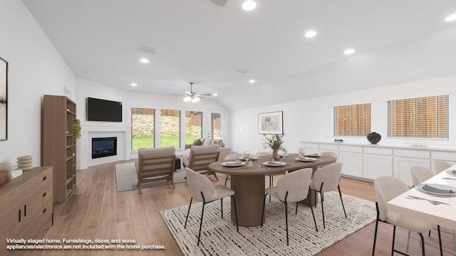 unfurnished living room with light wood-style floors, baseboards, ceiling fan, and visible vents