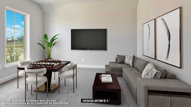 living room with vaulted ceiling, a wealth of natural light, and carpet floors