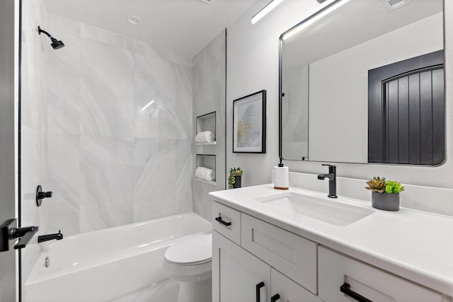 full bathroom featuring shower / bathtub combination, toilet, and vanity