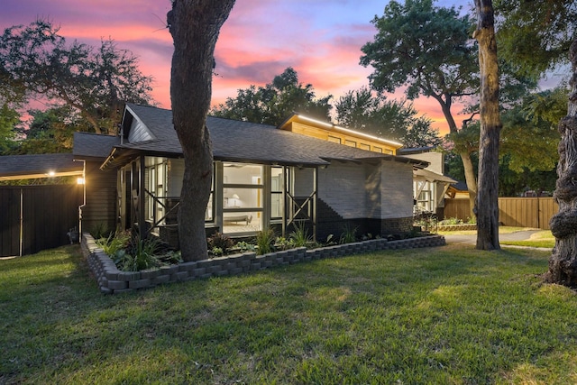 view of front of home featuring a yard