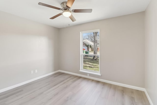 unfurnished room featuring ceiling fan and light hardwood / wood-style flooring