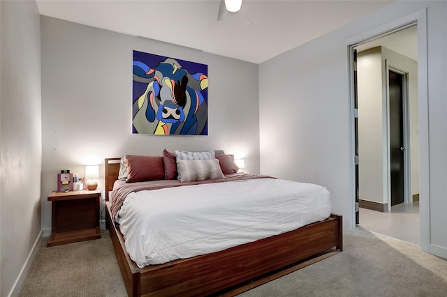 bedroom featuring ceiling fan and light colored carpet