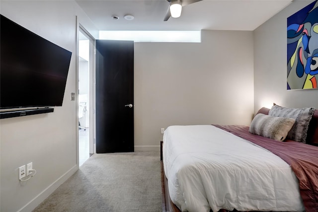 bedroom featuring ceiling fan and light colored carpet