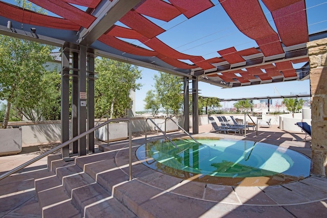 view of swimming pool with a pergola and a patio