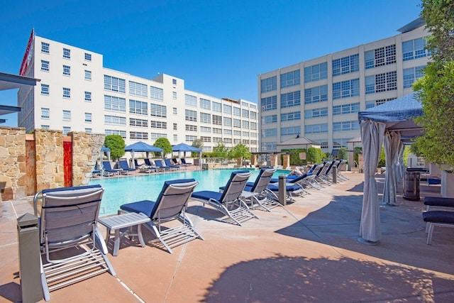 view of pool featuring a gazebo and a patio