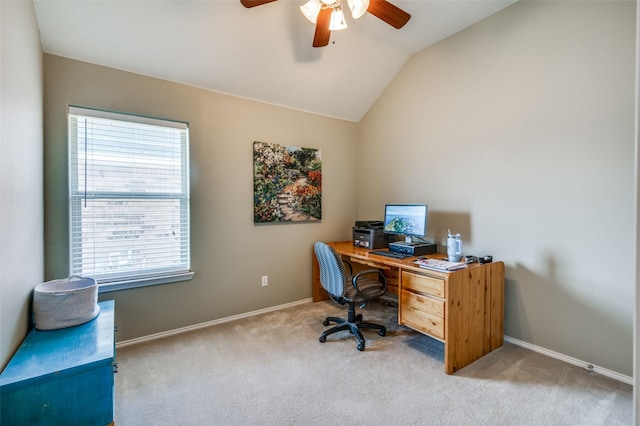 office area featuring vaulted ceiling, ceiling fan, and carpet