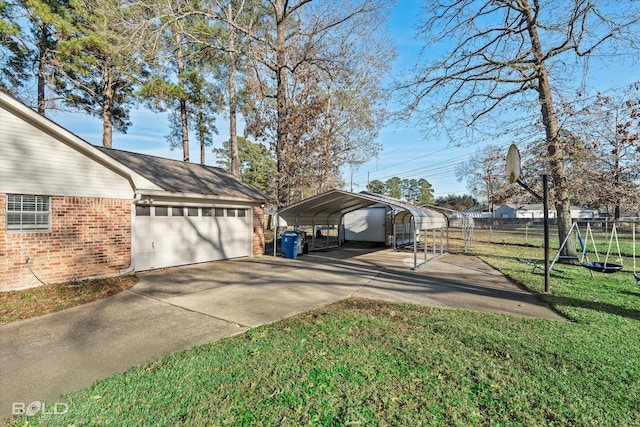 exterior space with a garage, a carport, and a yard