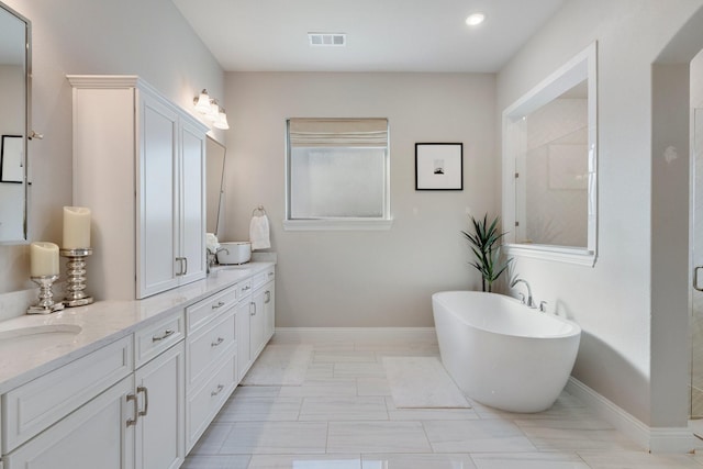 bathroom with separate shower and tub and vanity