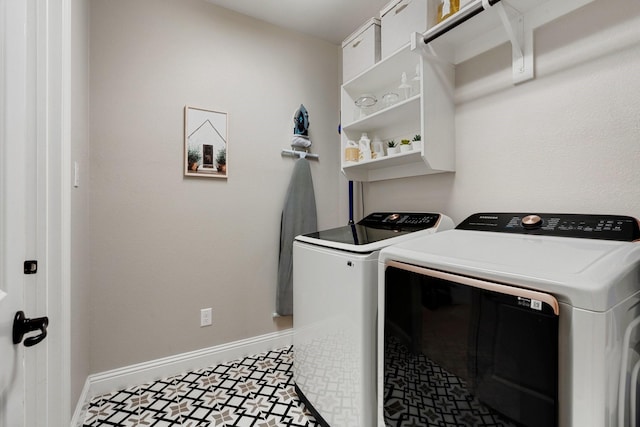 laundry room featuring washing machine and dryer