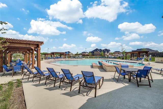 view of pool featuring a patio area and a pergola