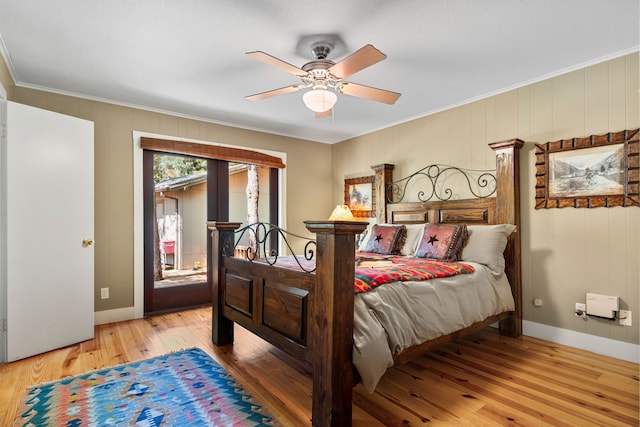 bedroom featuring ceiling fan, crown molding, and light hardwood / wood-style floors