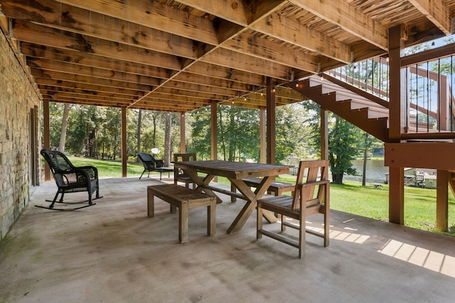 view of patio featuring a water view