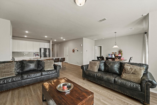 living room featuring light hardwood / wood-style flooring