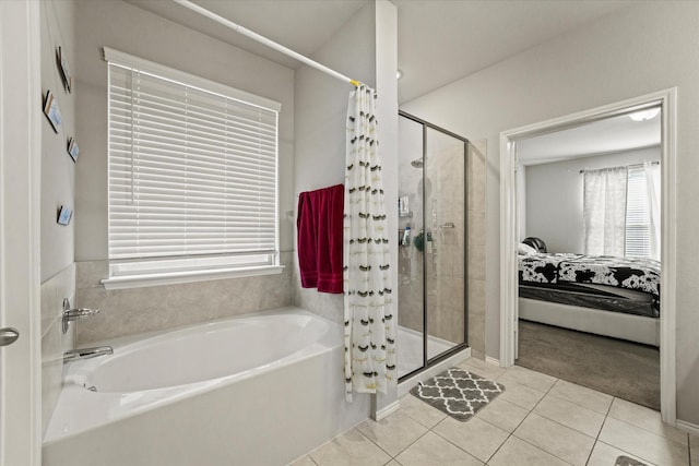 bathroom featuring tile patterned floors and plus walk in shower