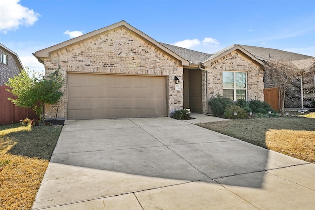 ranch-style house featuring a garage