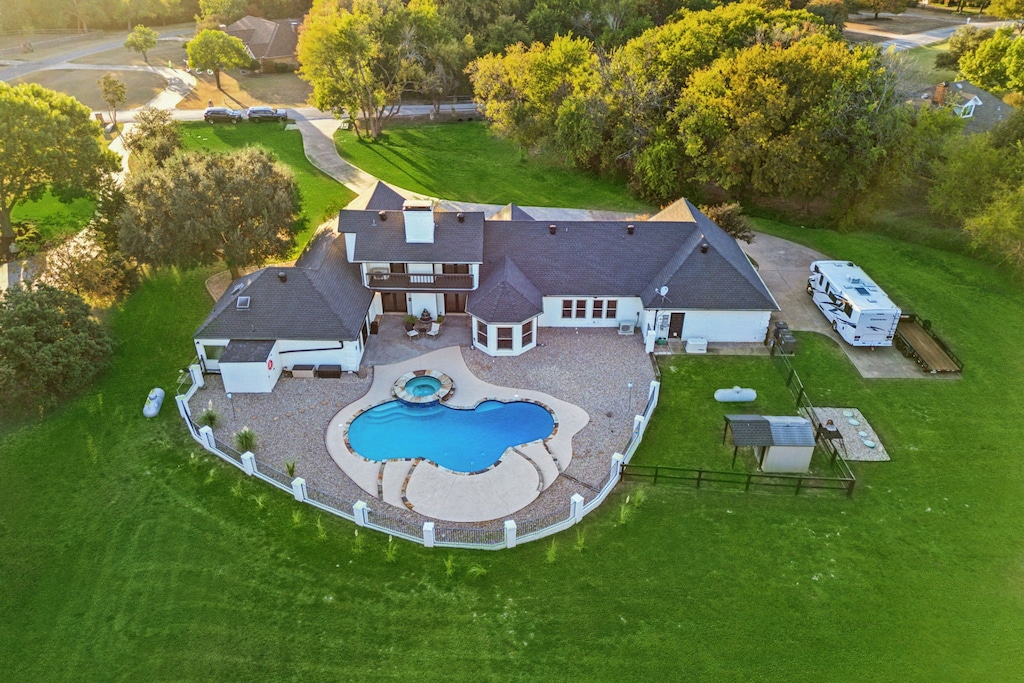 view of swimming pool featuring a fenced backyard