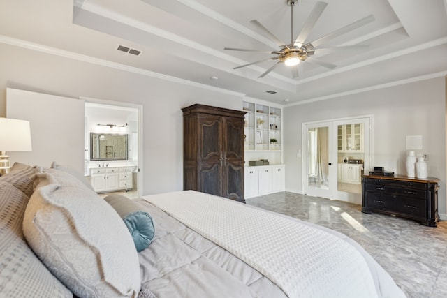 bedroom featuring marble finish floor, visible vents, a raised ceiling, and connected bathroom