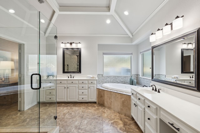 bathroom featuring a garden tub, vanity, vaulted ceiling, ornamental molding, and a stall shower