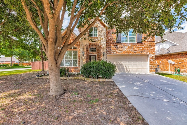 view of front of home with a garage