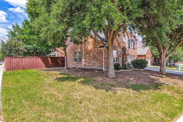 view of yard featuring a garage