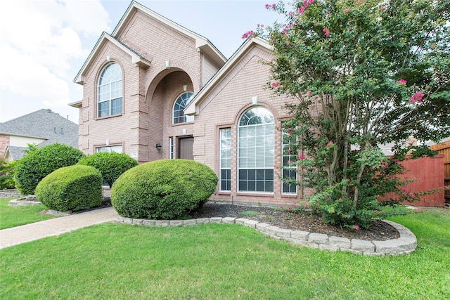 view of front of home with a front yard