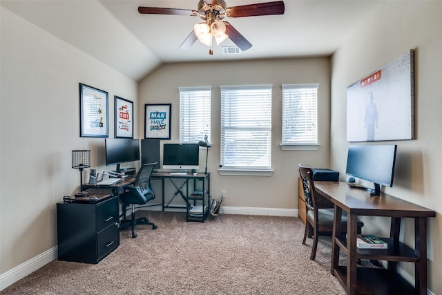 office space featuring ceiling fan, carpet flooring, and lofted ceiling