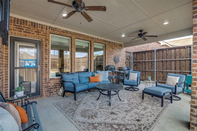 view of patio featuring ceiling fan and outdoor lounge area