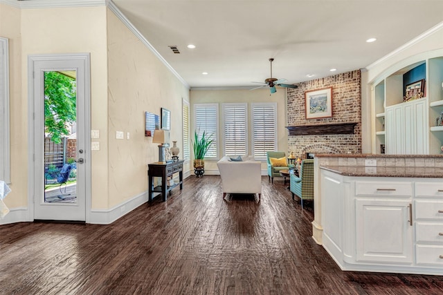 kitchen with dark wood-type flooring, ceiling fan, a healthy amount of sunlight, and white cabinets