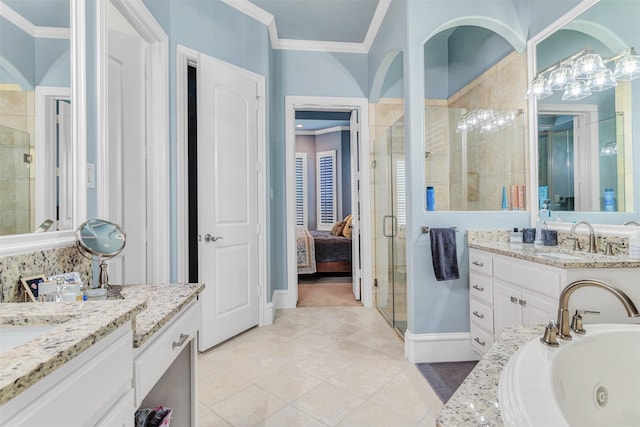 bathroom featuring tile patterned floors, vanity, ornamental molding, and shower with separate bathtub