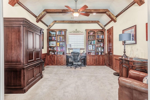 office area featuring light carpet, ceiling fan, lofted ceiling, and wood walls