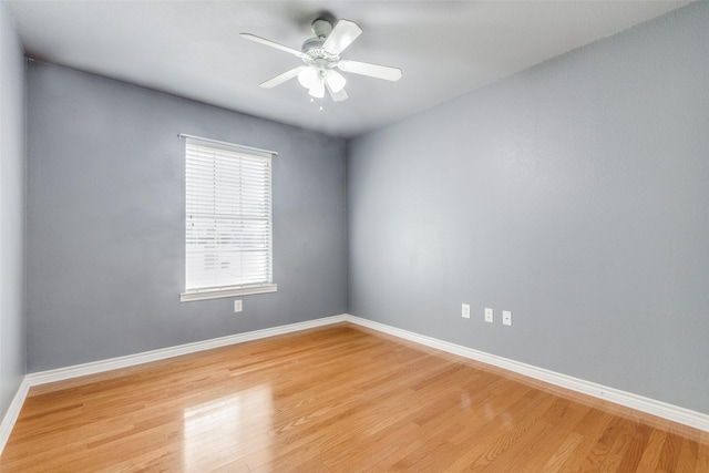 unfurnished room with ceiling fan and light hardwood / wood-style floors