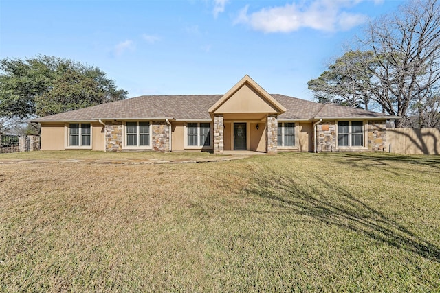 single story home with a front yard