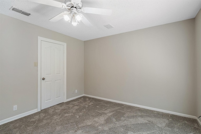 unfurnished room featuring ceiling fan and carpet flooring