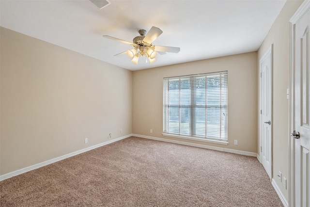 carpeted empty room with ceiling fan