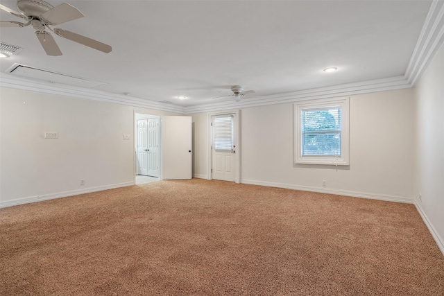 spare room with carpet, ceiling fan, and crown molding