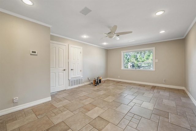 unfurnished room featuring ceiling fan and ornamental molding