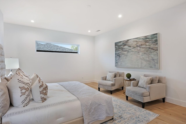 bedroom featuring light hardwood / wood-style floors