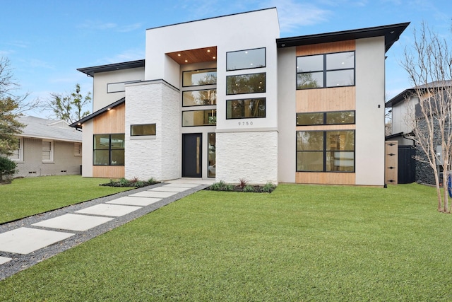 contemporary home featuring a front yard