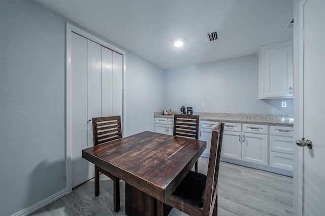 dining room featuring light wood-type flooring