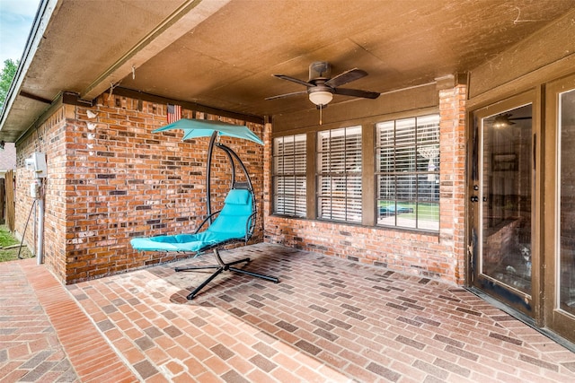 view of patio featuring ceiling fan