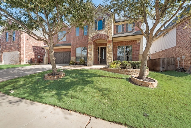 view of front facade featuring a garage and a front yard