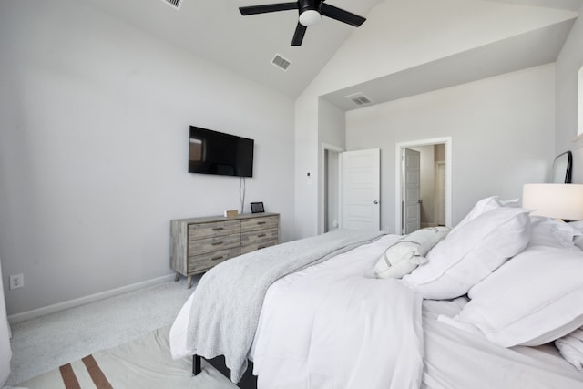 bedroom with ceiling fan, high vaulted ceiling, and light colored carpet