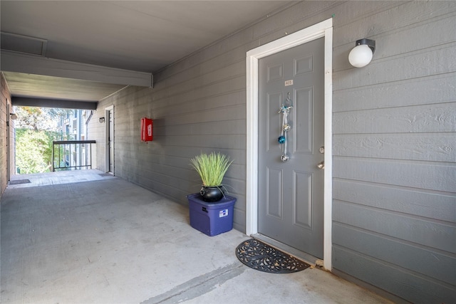 property entrance with a porch