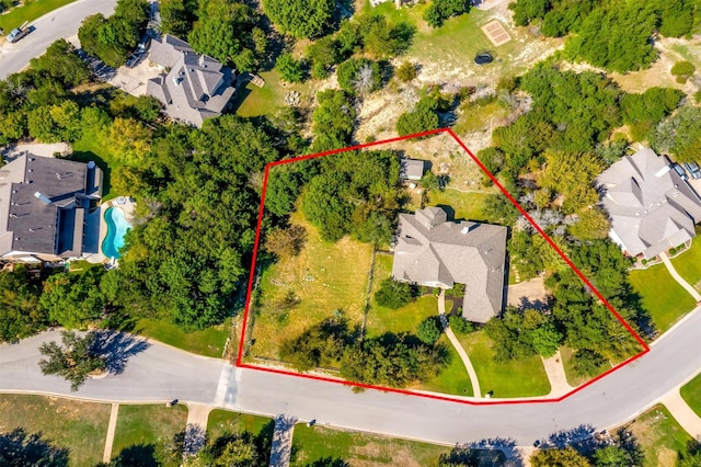 birds eye view of property with a residential view