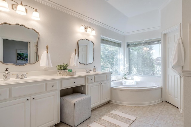 bathroom with double vanity, a garden tub, crown molding, and a sink