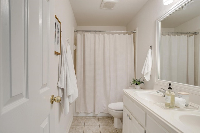 full bathroom with toilet, vanity, shower / bath combo, and tile patterned floors