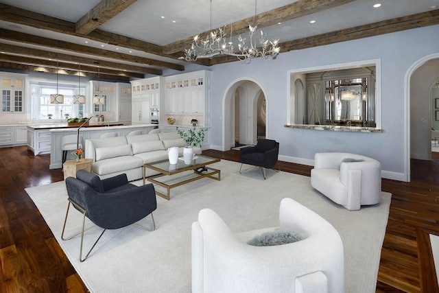 living room featuring dark hardwood / wood-style flooring and beam ceiling