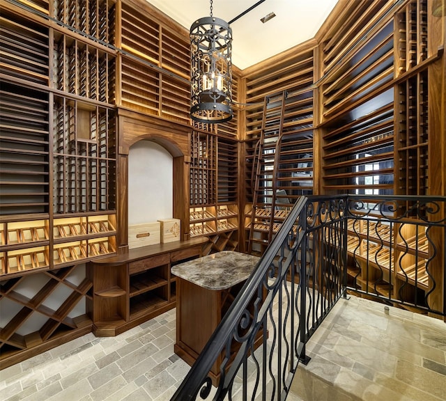 wine room with a chandelier