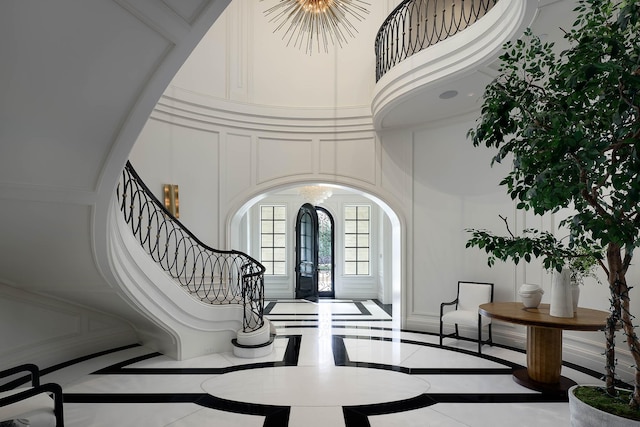 entrance foyer featuring a chandelier